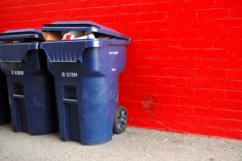 Workers sorting recyclables into containers